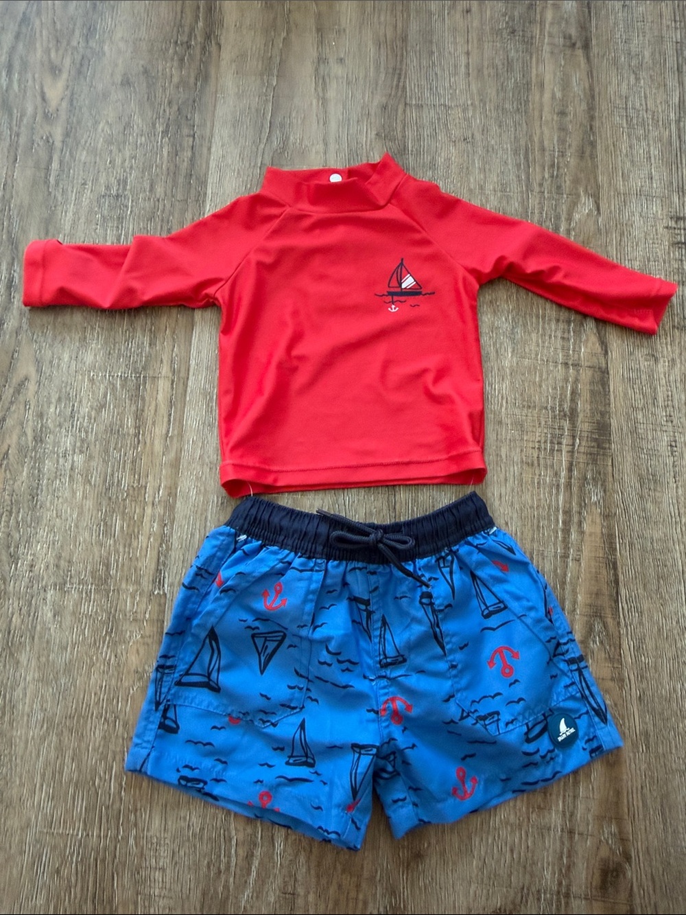 Kids Red Long-Sleeve Rash Guard with Blue Sailboat Swim Shorts